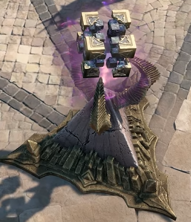 Horadric's Cube floating above a pillar within a town hub in Diablo 4.